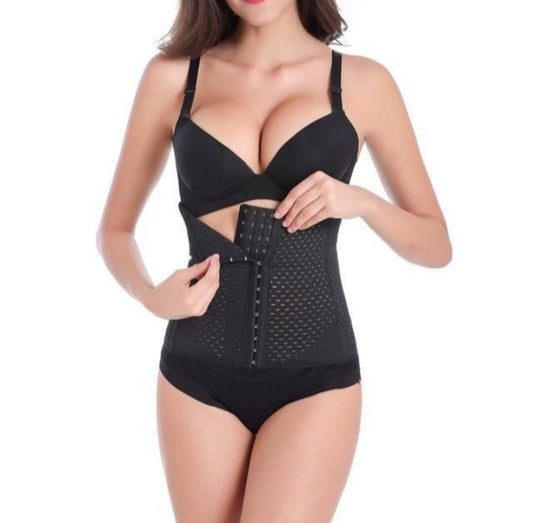 Black waist trainer worn by a model on a white background