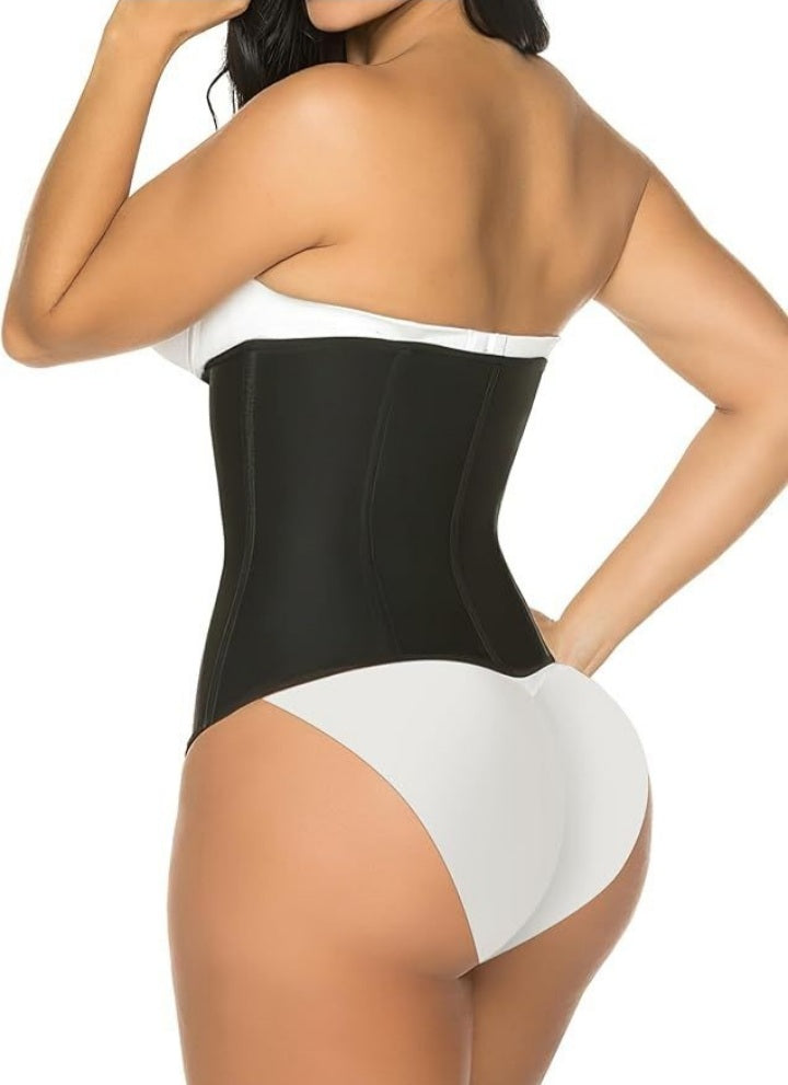 Person wearing a black waist trainer shapewear on a white background